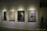 Ekonomi belum pulih, selera orang membeli karya lukisan berkurang 