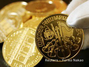 Menyilaukan, Si Kuning Bersinar US$ 957,10 per Ounce