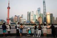 China's Economy Meets Official Growth Target, But Many Feel a Downturn