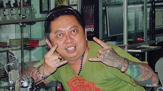 Dulu desainer grafis, kini bikin tato artis