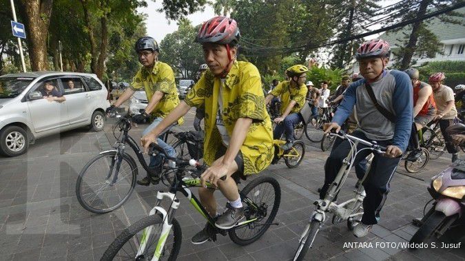 Sebelum upacara, Jokowi bersepeda pagi di KBT