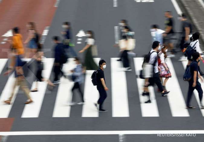 Japan's travel ban to contain virus unfair, western businesses say