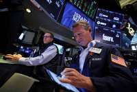 Wall Street Ditutup Bervariasi, Data Inflasi AS Dukung Optimisme Suku Bunga The Fed
